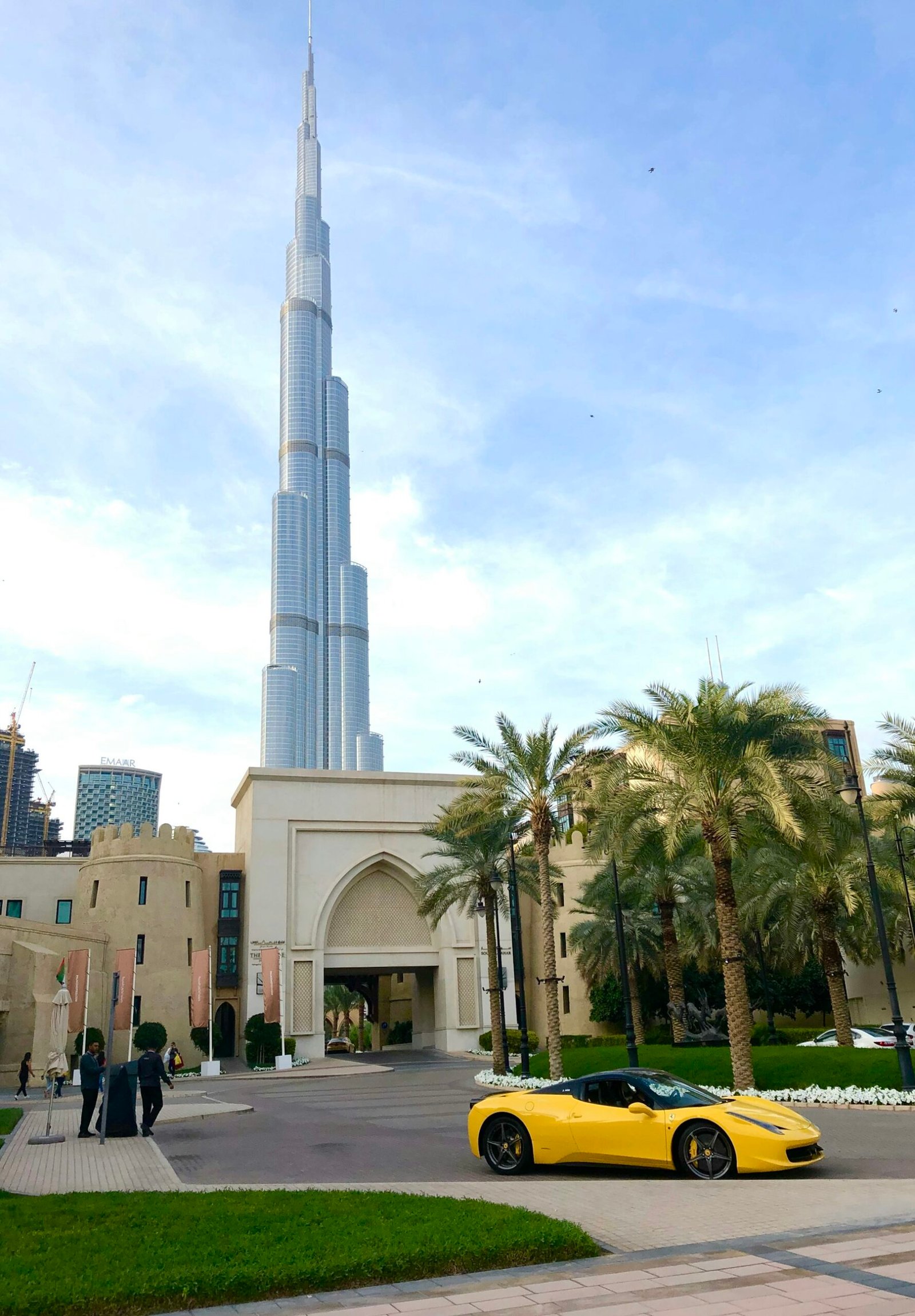 Downtown Dubai in daylight with palm trees